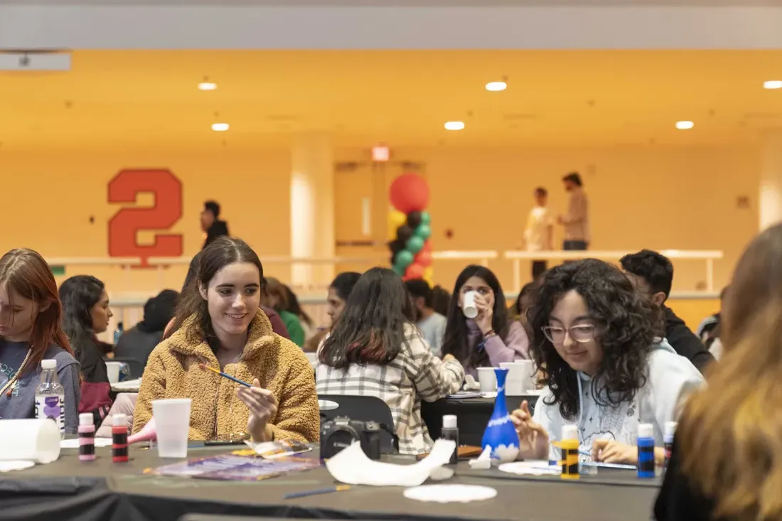 Students painting at the Goldstein Center